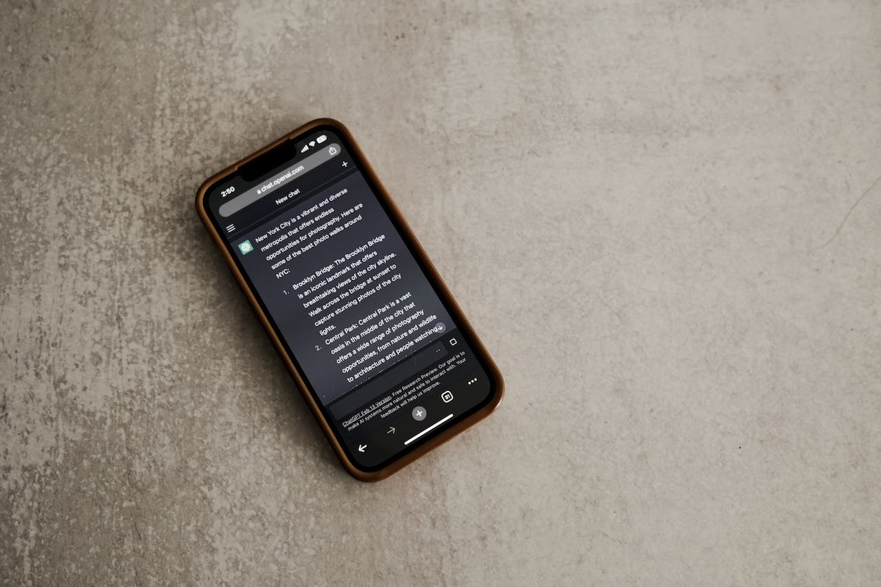 A Cell Phone With a Screen Showing a Book